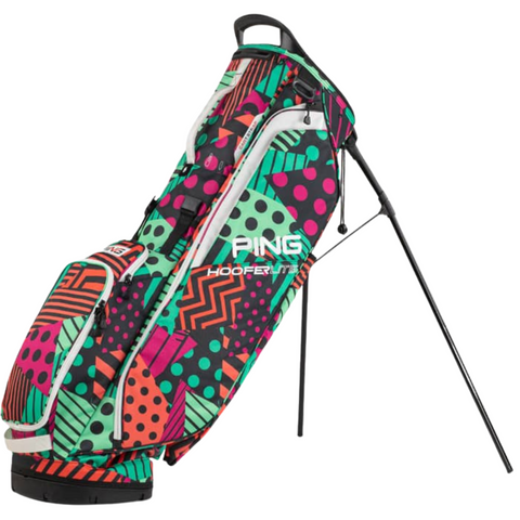 The PING Hoofer Lite 231 Stand Bag | Watermelon by Ping features a vibrant red, green, black, and pink geometric pattern with dots and stripes. Lightweight and stylish, it offers a stand plus multiple convenient pockets.
