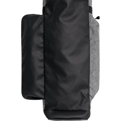 A close-up of the PING Moonlite Soft Pencil Carry Bag in Heather Grey/Black by Ping, highlighting the side pocket, part of the main compartment, visible zippers, and textured fabric.