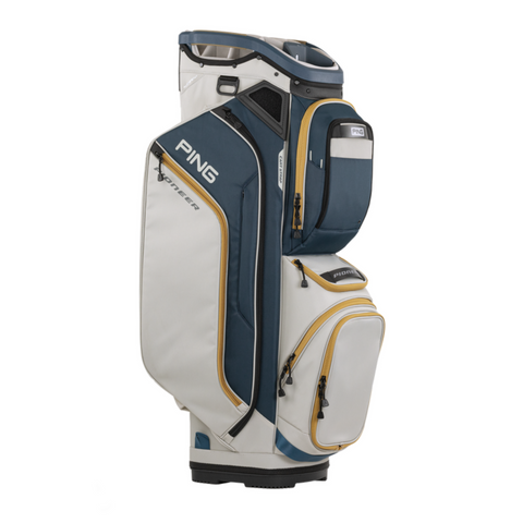 The Ping Pioneer 244 Golf Cart Bag, in white and blue with gold accents, multiple zippered pockets, and a sturdy base, is shown upright on a plain white background—an ideal premium cart bag for New Zealand golfers.