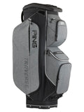 A PING Traverse golf bag in heather gray and black, featuring multiple zippered compartments and the PING logo printed on the bag