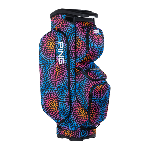 The Ping Traverse 244 Cart Bag | Mosaic features a vibrant dotted pattern in blue, orange, pink, and purple, the Ping logo in white on the side, and convenient 14-way dividers for organized club storage.