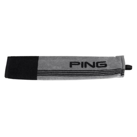 A gray and black rectangular PING Tri-Fold Golf Towel by Ping, featuring PING lettering and a small black loop for easy attachment, ideal for cleaning clubs, shown laid flat on a white background.