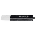The PING Tri-Fold Golf Towel by Ping is black and white with horizontal stripes, “PING” in white lettering, and a small black hanging loop—ideal for cleaning clubs on the course.