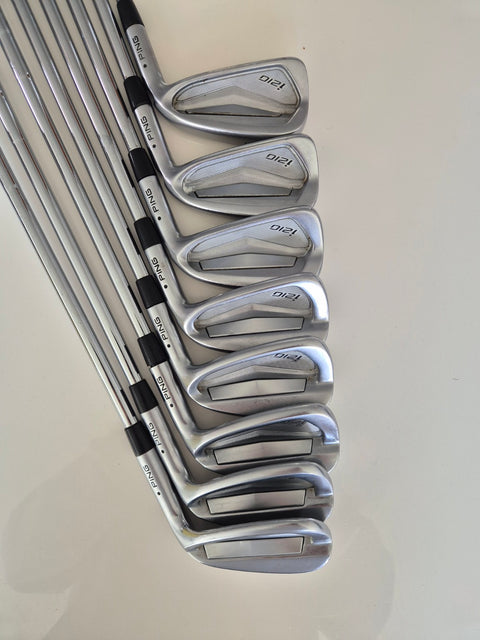 Backs and black dot markings on the eight used PING i210 irons