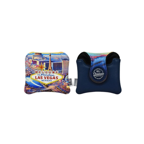 Two small pouches are shown—one displays a vibrant Las Vegas cityscape with the “Welcome to Fabulous Las Vegas Nevada” sign, while the other, the PRG Originals 2025 Vegas Strip Mallet Putter Headcover, features a “Riz Originals” badge.