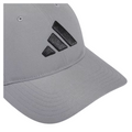 Close-up view of the grey Adidas Performance golf hat, highlighting the black Adidas logo on the front and the detailed stitching on the curved brim.