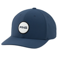 Navy blue Ping Patch Cap with a curved brim and a round white patch featuring the black Ping logo centered on the front.