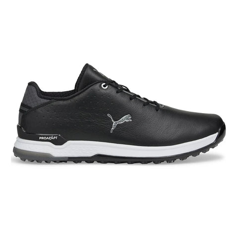 Side view of Puma Mens Proadapt Alphacat Golf Shoes in black/silver (US 8 only), featuring a white sole, silver Puma logo, black laces, textured details, multi-surface traction, and PROADAPT on the sole near the heel.