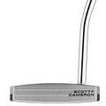 Close-up of a Scotty Cameron Long Design Phantom 11 Putter head, featuring a silver finish, textured face, and the Scotty Cameron brand name engraved in black on the lower right corner with shaft attached at the upper right.
