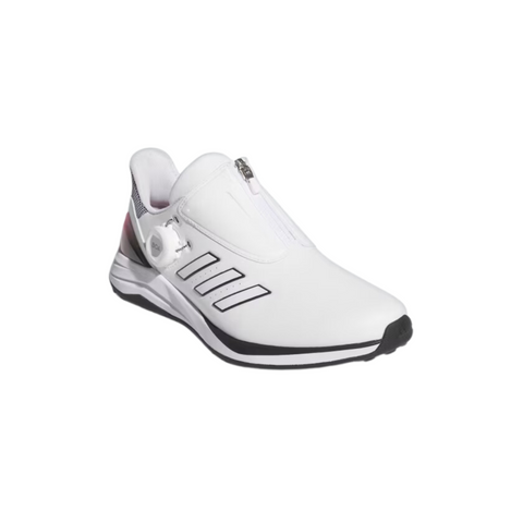 Top-side view of Adidas Solarmotion BOA 2024 spikeless women’s golf shoes. The white shoe has black Adidas stripes and a BOA dial for closure on the side. A black outline accents the midsole and toe, and the back features a grey mesh with a pink-to-black gradient. Designed for a secure fit and comfort with a sleek, modern style.