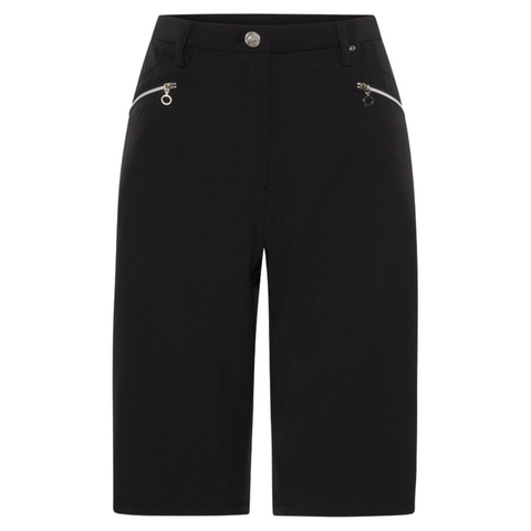 The Sporte Leisure Womens Core Short by Sporte Leisure are black, knee-length performance shorts with a button and zip closure, two front zippered pockets, belt loops at the waistband, shown on a white background.