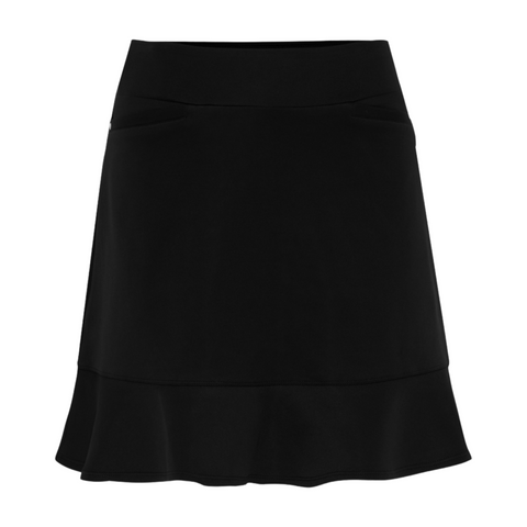 The Sporte Leisure Womens Skort with Frill is a black skort featuring a fitted waistband and subtle ruffle hem, ideal for golf or activewear. Displayed on a plain white background. Brand: Sporte Leisure.