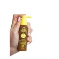 A hand with light pink nail polish holds a brown bottle of Sun Bum Scalp & Hair Mist SPF 30 Sunscreen Spray (59ml) with a yellow cap and nozzle against a white background.