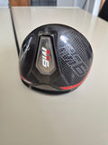 Used TaylorMade M6 9 degree driver sole showing cosmetic wear
