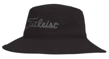 The Titleist 2023 Stadry Bucket Hat is a waterproof black hat with a wide brim and large, cursive Titleist embroidery on the front—perfect for staying dry on rainy days.
