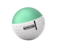 A white dimpled Titleist 2024 Tour Soft Golf Ball is partially cut to show its green core. The outer layer features a black TOUR SOFT stripe, emphasizing real feel and long carry. Set against a white background.