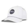 The Titleist 2025 Boardwalk Rope Cap is a white cap with a curved brim, stylish rope accent, and a round patch displaying Titleist on the front above a thin gray stripe.