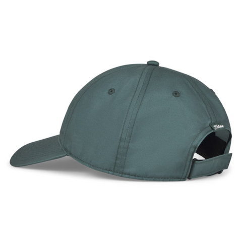 The Titleist 2025 Montauk Lightweight Cap is a dark green golf hat with a curved brim, ventilation eyelets, and adjustable metal-strap back—an ideal stylish choice for NZ golfers.