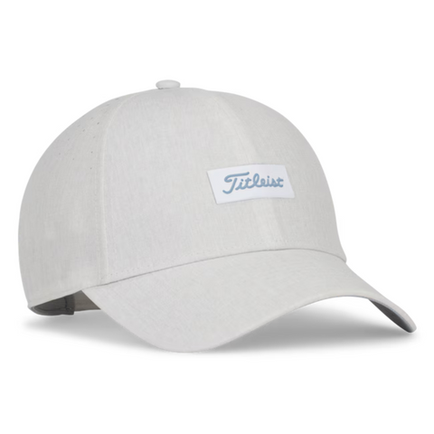 The Titleist 2025 Womens Charleston Breezer Cap in Heather White features a curved brim, adjustable strap, UV protection, and a rectangular front patch with light blue Titleist script—perfect for stylish sun protection on the course.