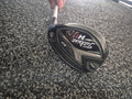 Used Titleist 818 H1 27 degree right-handed hybrid sole showing condition