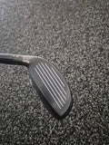 Used Titleist 818 H1 27 degree hybrid clubface showing groove and face condition