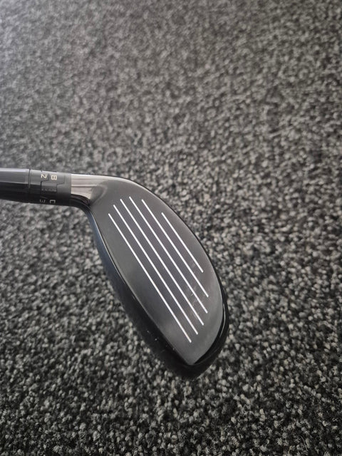 Used Titleist 818 H1 27 degree hybrid clubface showing groove and face condition