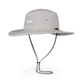 The Titleist Charleston Aussie Bucket Hat in Grey/White features a wide brim, chin strap, front patch, and side eyelets for breathability—offering reliable sun protection and comfort during long days on the golf course.