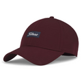 The Titleist Charleston Breezer Cap in Burgundy/Navy/White features a curved brim and a black patch with the white Titleist logo, designed for breathability and comfort on the golf course.