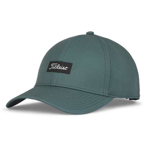 The Titleist Charleston Breezer Cap in Eucalyptus/Black/White features a curved brim, black rectangular front patch with white Titleist logo, stitched panels, breathable design, and an adjustable back strap.