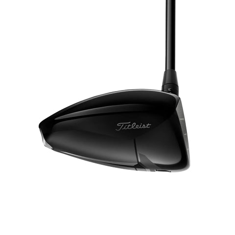 Black golf club head with 'Titleist' branding on the toe of the club on a  white background