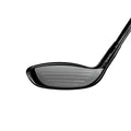Close-up of a black golf club on a white background