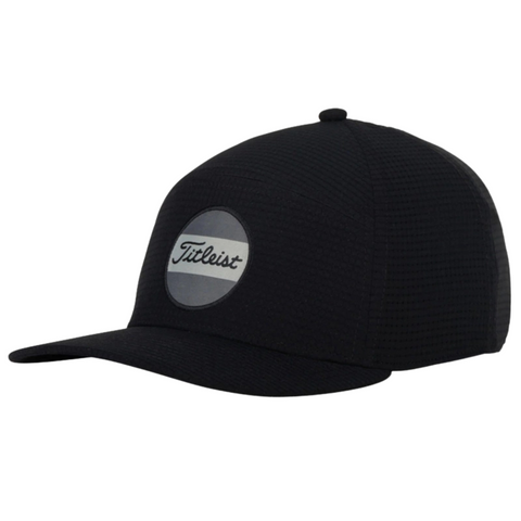 The Titleist Junior Boardwalk Cap features a black design, slightly curved brim, and a round gray and white Titleist logo patch—ideal junior golf gear from Titleist.