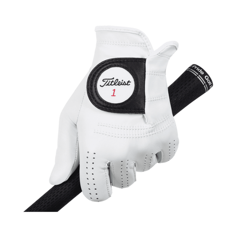 A left hand wears the Titleist Men's Players Golf Glove, gripping a black golf club. The tour-proven glove features the Titleist logo and a number 1 on a circular wrist patch.