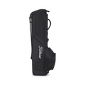 A black Titleist Players 4 Carbon Stand Bag 2025 stands upright on a white background, featuring carbon fiber legs, a spacious side pocket, and Titleist in white script along the side.