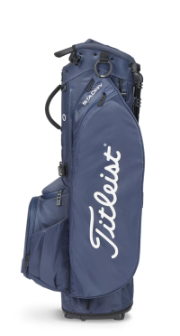 The Titleist Players 5 StaDry Stand Bag in navy blue features multiple zippered pockets, a large white Titleist logo, and a lightweight, waterproof design to keep your golf gear dry and organized.