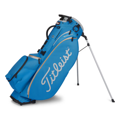 The Titleist Players 5 StaDry Stand Bag stands upright on two legs, features multiple zippered compartments, a waterproof design for protection, and displays the Titleist logo on the side.
