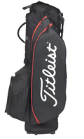 The Titleist Players 5 Stand Bag, a premium black golf bag with red accents and a bold white Titleist logo, stands upright against a white background.