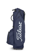The Titleist Players 5 Stand Bag in navy blue features multiple zippered pockets and displays the white Titleist logo on the side—a premium choice for dedicated golfers.