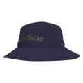The Titleist Stadry Performance Bucket Hat is a navy blue, waterproof golf hat with Titleist embroidered in black on the front—perfect for keeping dry on rainy days out on the course.