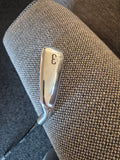 Sole of used Titleist U505 3 iron showing minimal use