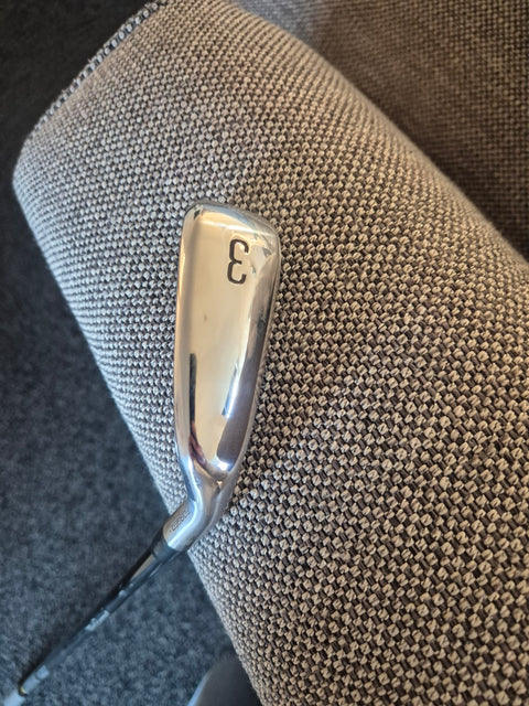 Sole of used Titleist U505 3 iron showing minimal use