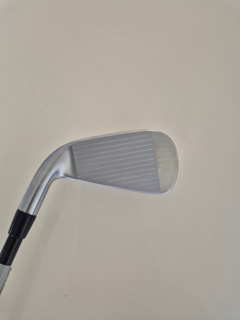Face of used Titleist U505 3 utility iron in very good condition
