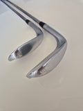 Soles of the actual Titleist Vokey SM7 54-14F and 58-08M wedges