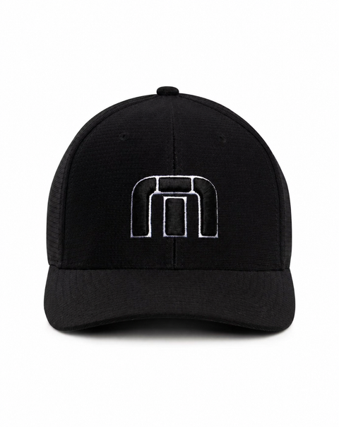 TravisMathew B-Bahamas Fitted Cap in Black – front view on a clean white background