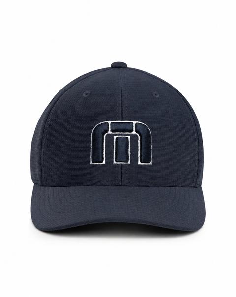TravisMathew B-Bahamas Fitted Cap in Navy – front view on a clean white background