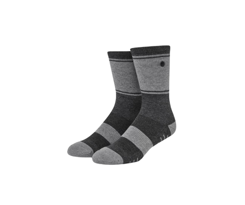 The TravisMathew Baja 2.0 Crew Socks by Travis Mathew are grey crew socks with horizontal stripes and a small circular logo near the top. Displayed on a white background, these moisture-wicking socks deliver both style and comfort.