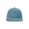 The TravisMathew Hidden Agenda Snapback Cap by Travis Mathew is a blue adjustable golf hat with white trim, featuring TRAVIS MATHEW ESTABLISHED 2007 DESIGNED IN CA embroidered on the front, shown against a white background.