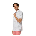 TravisMathew On A Mission men's polo White side model view