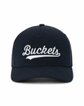 TravisMathew TM Buckets Snapback Hat in Total Eclipse – front view on a clean white background