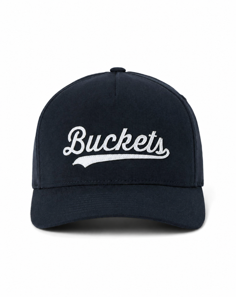 TravisMathew TM Buckets Snapback Hat in Total Eclipse – front view on a clean white background